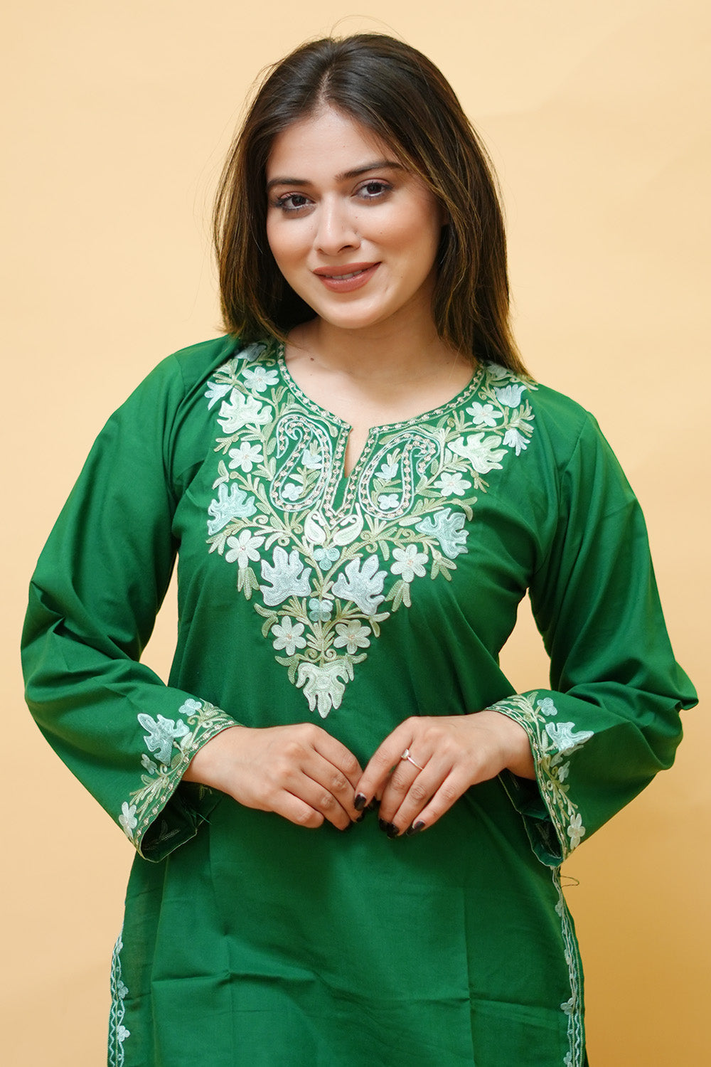 Dark Green Cotton Aari Work Kurti With Multicoloured