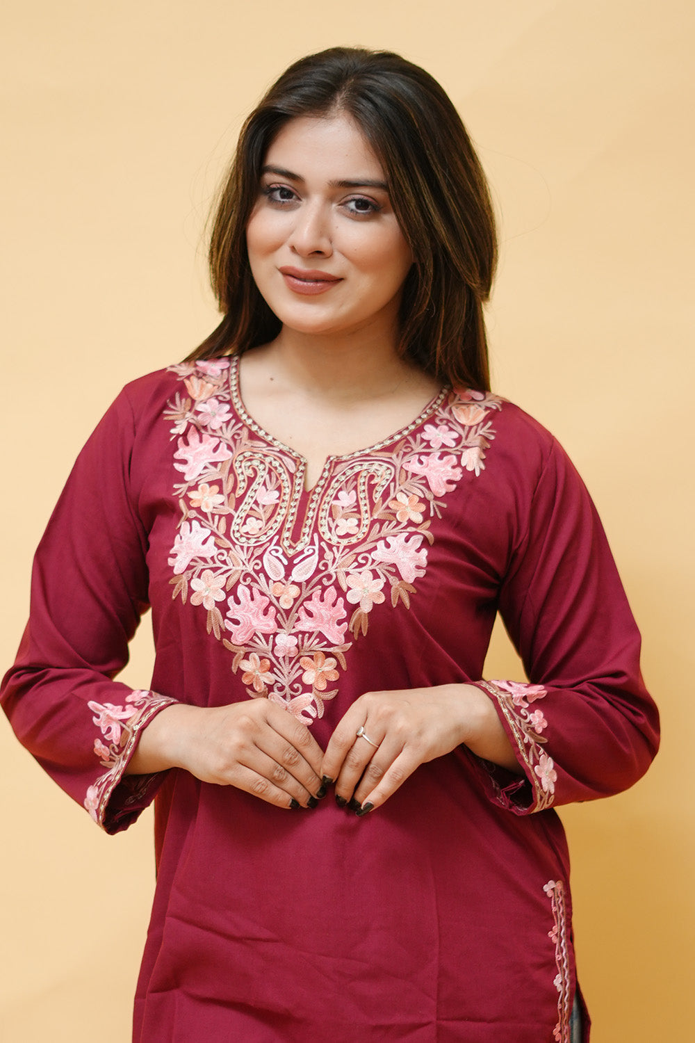 Maroon Cotton Aari Work Kurti With Multicoloured Neckline