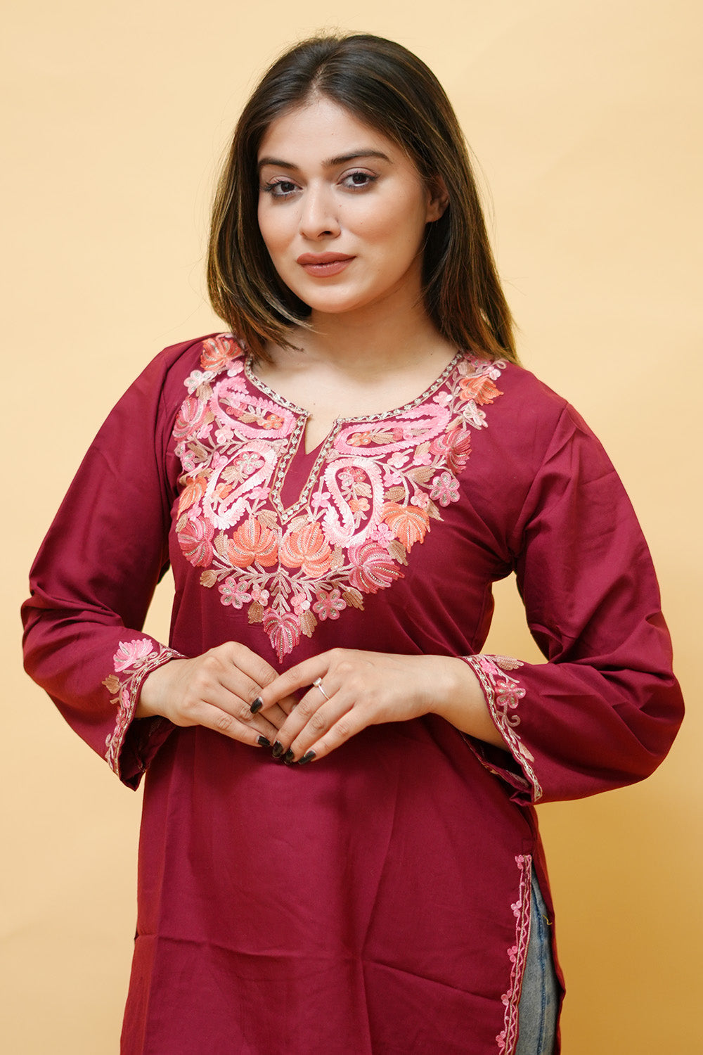 Maroon Cotton Aari Work Kurti With Multicoloured Neckline