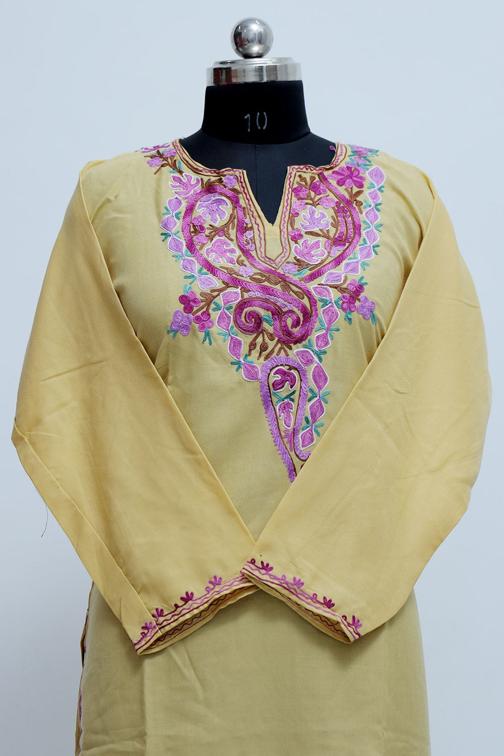 Mesmerising Beige Colour Cotton Kurti With Beautiful Aari