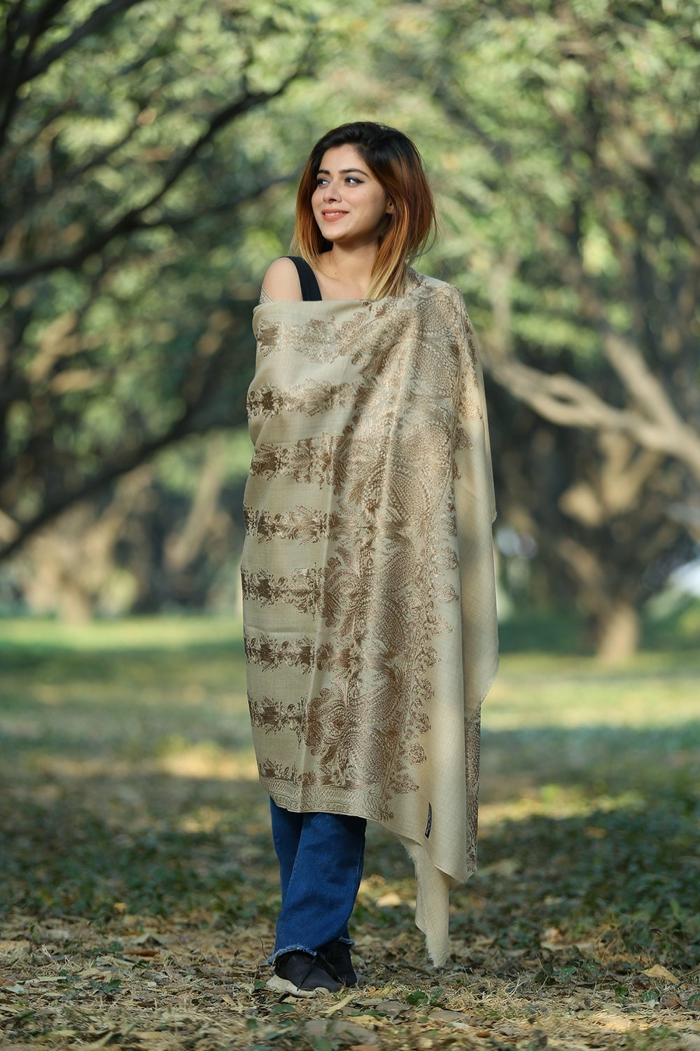BEIGE COLOUR SHAWL DEFINES FEMINISM AND ENHANCES