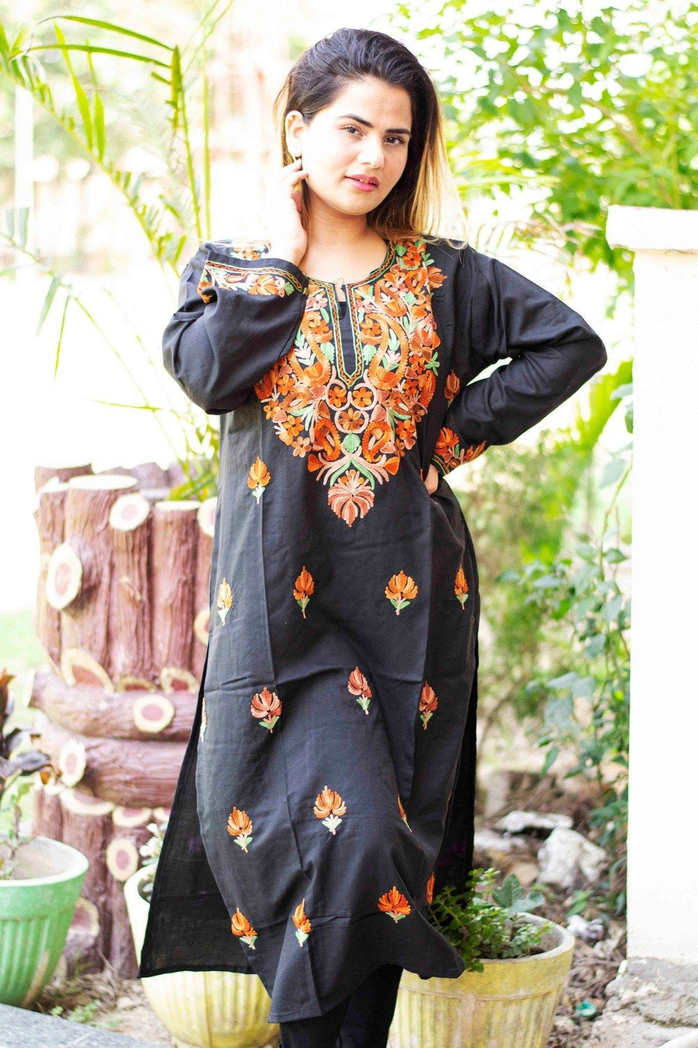 white christmas dresses Black colour cotton kurti with beautiful aari embroidery gives