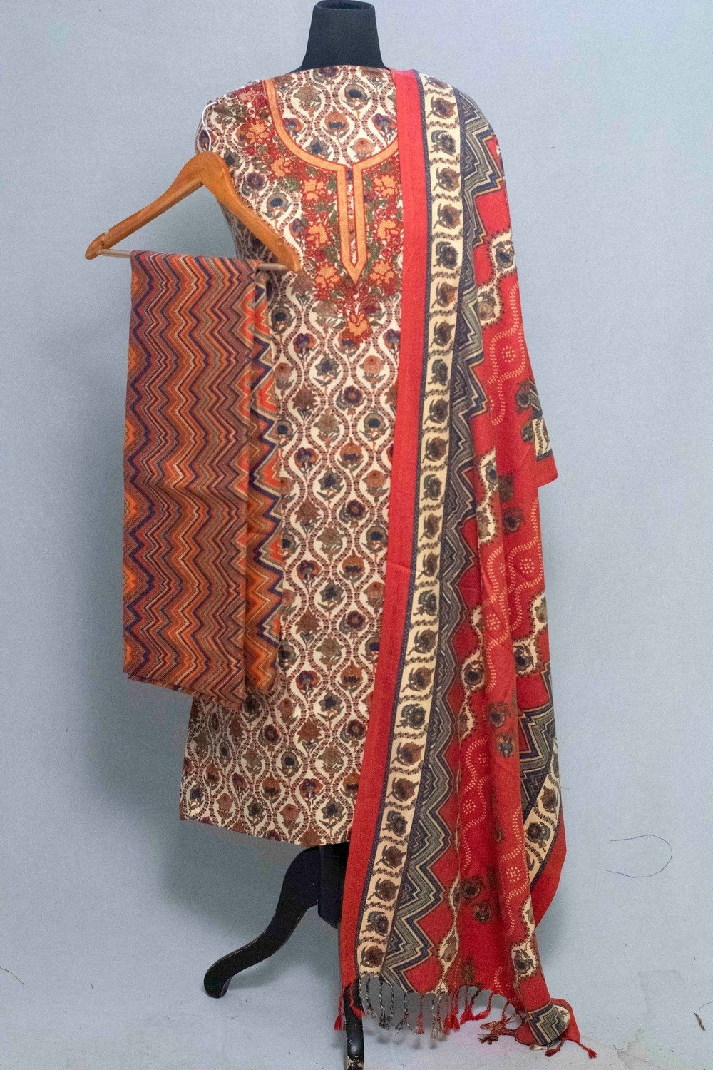 Cream Colour Woolen Kani Printed Suit With Neck And Over