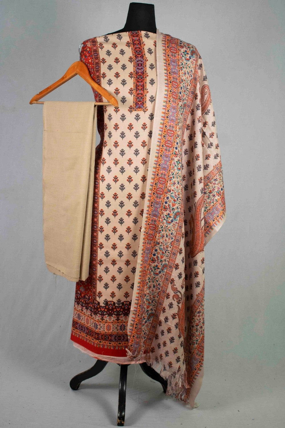 Steady Beige Colour Woolen Kani Printed Suit With Neck