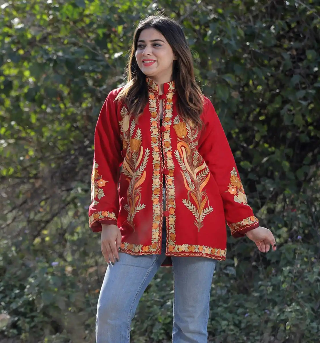 A red embroidered jacket with a mandarin collar.