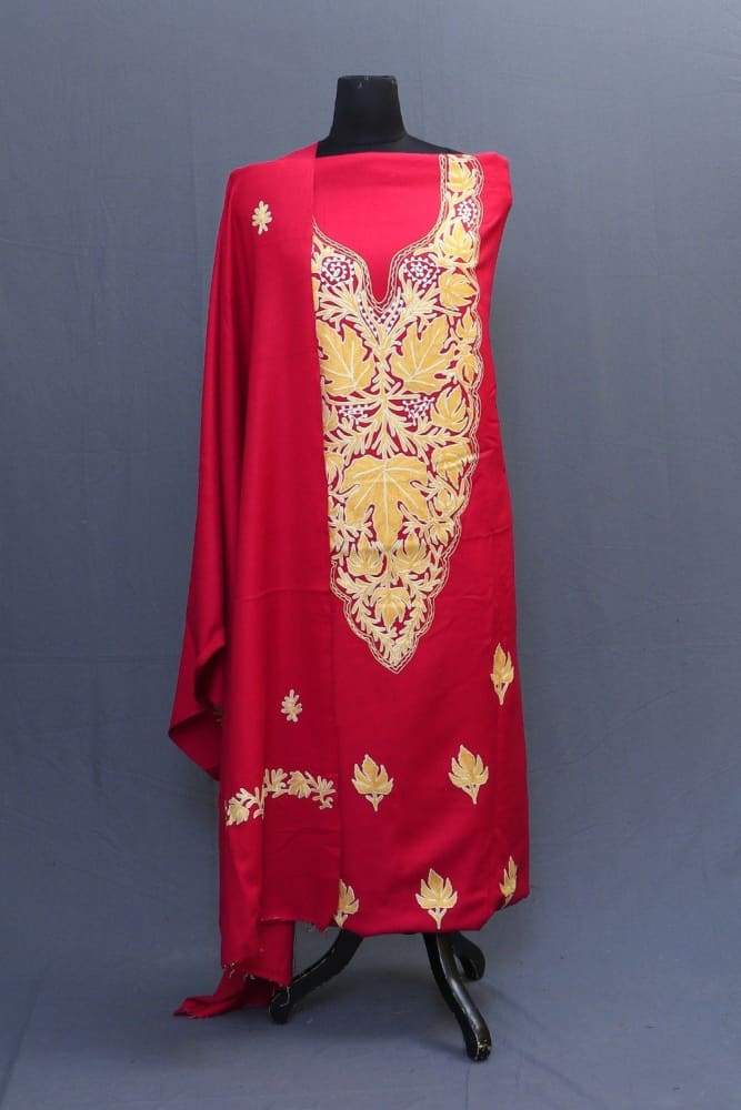 Majenta Colour Suit With Heavy Embroiderd Neck
