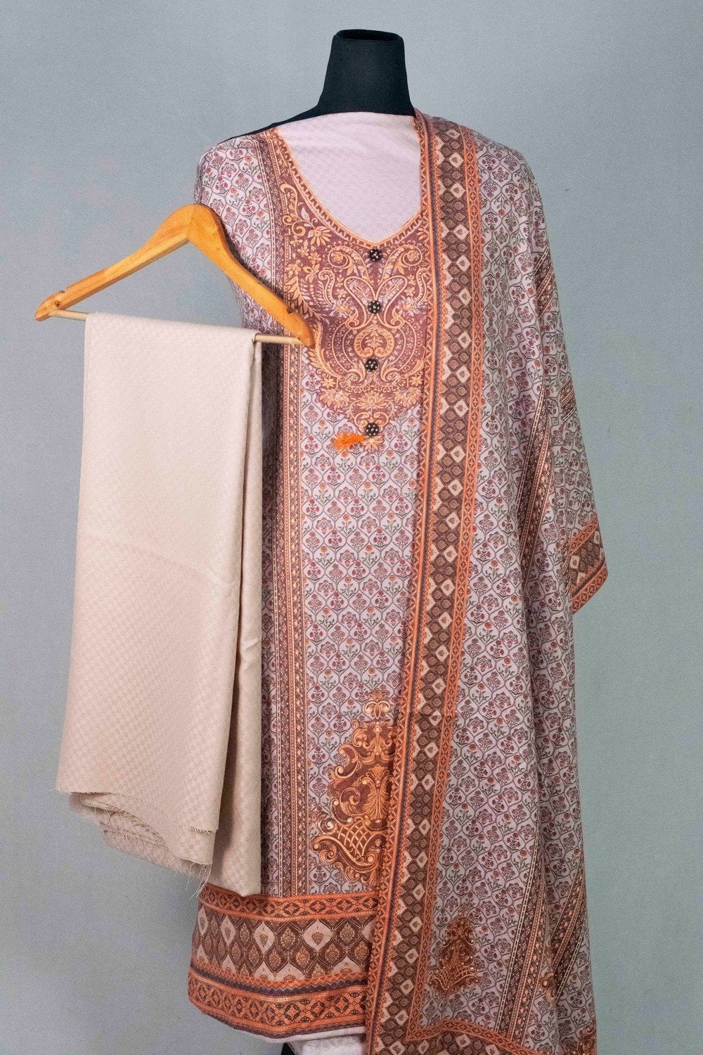 Pastel Colour Woolen Kani Printed Suit With Neck And OverAll